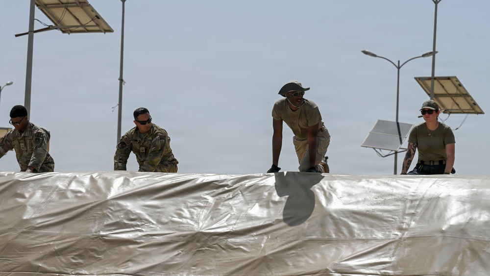 USAFCENT Airmen install POL liner