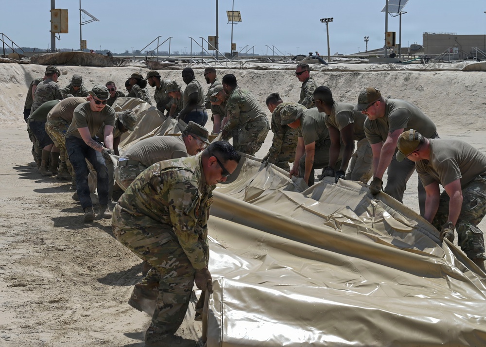 USAFCENT Airmen install POL liner
