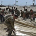 USAFCENT Airmen install POL liner