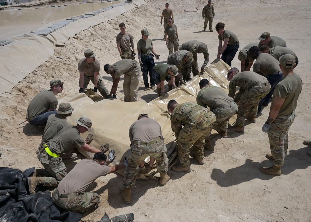 USAFCENT Airmen install POL liner
