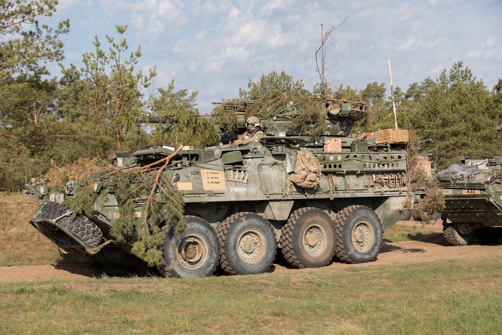 U.S. Soldiers from 1st Squadron, 2d Cavalry Regiment, conduct blank fire training in Poland
