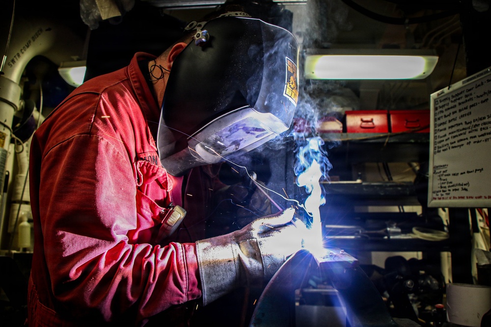 Frank E. Petersen Jr. Sailors Conduct Maintenance