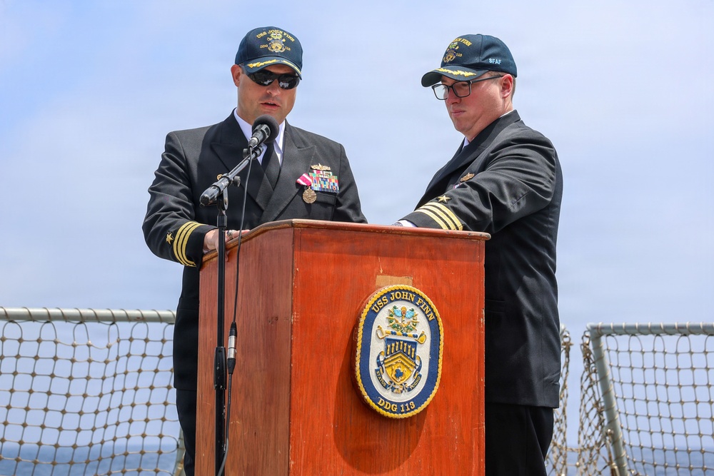 John Finn Conducts a Change of Command Ceremony