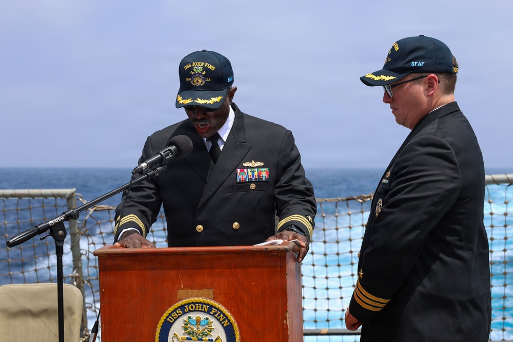John Finn Conducts a Change of Command Ceremony