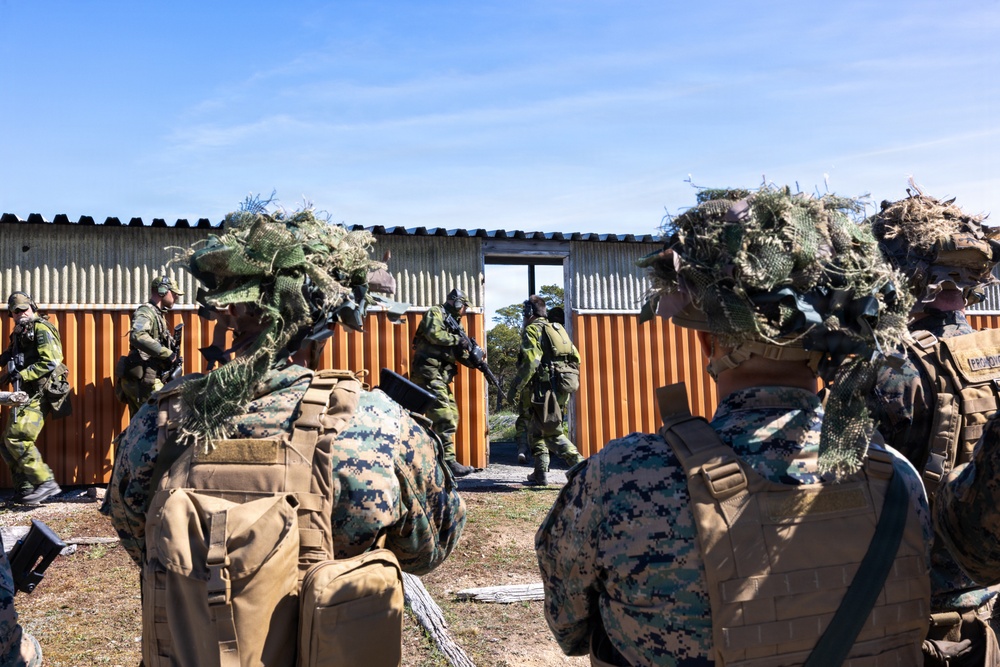 U.S. Marines, Swedish Soldiers conduct small unit tactics and medical training during Aurora 26