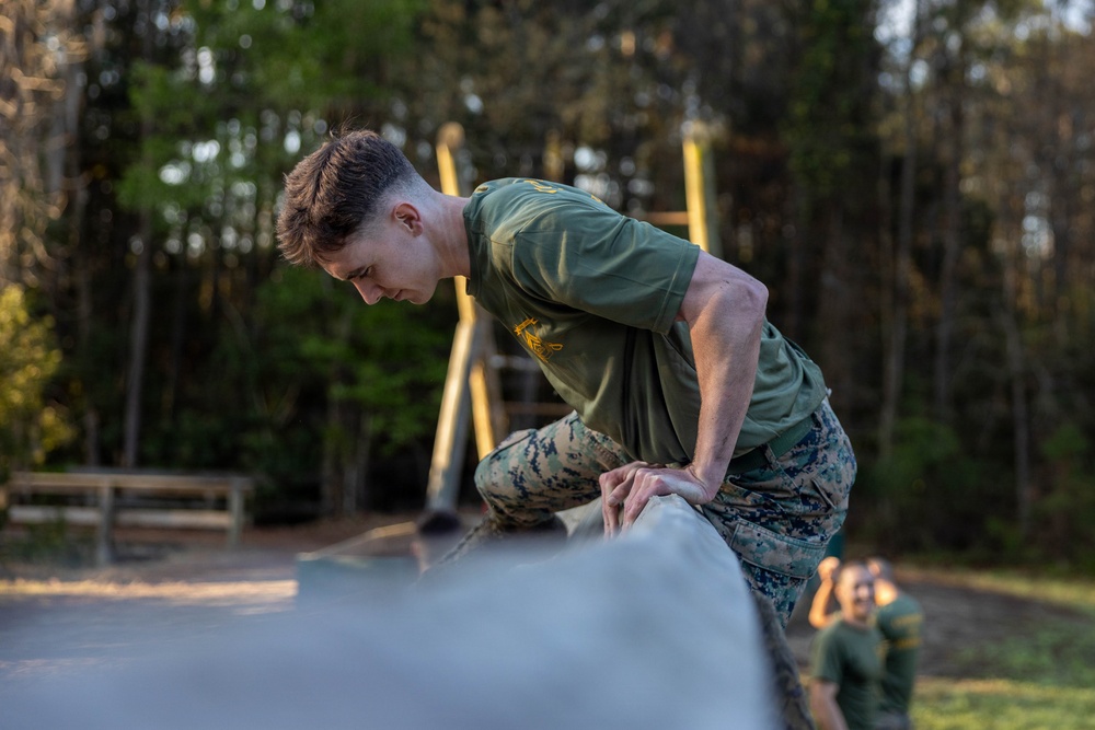 Corporals School 3-26 runs the Confidence Course