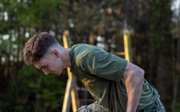 Corporals School 3-26 runs the Confidence Course
