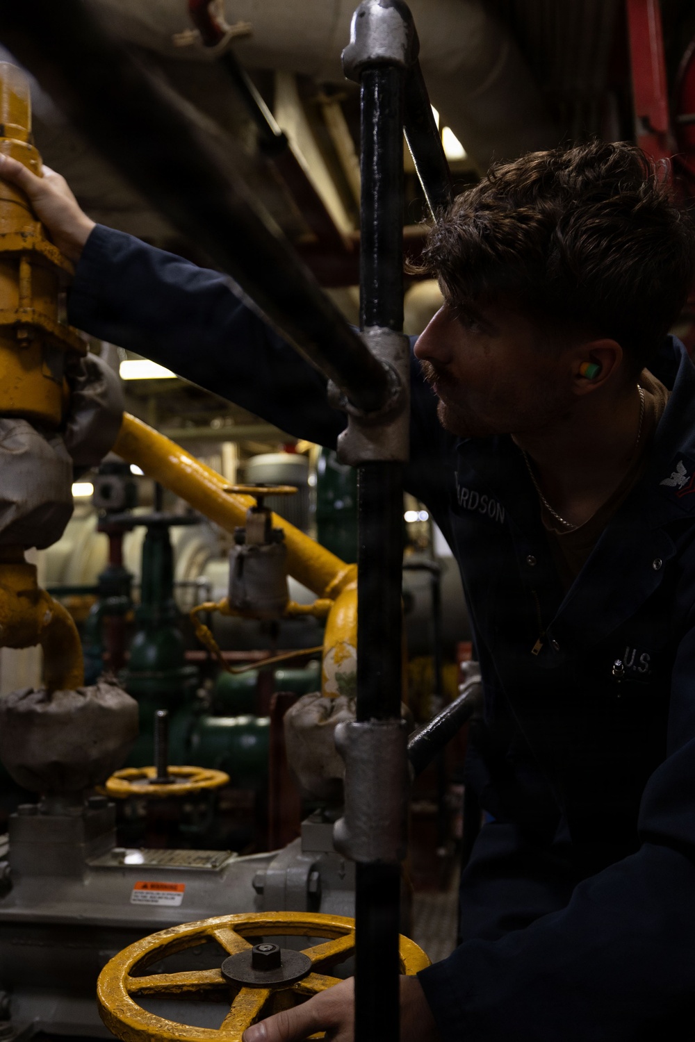 USS Iwo Jima Sailors Preform Boiler Maintenance