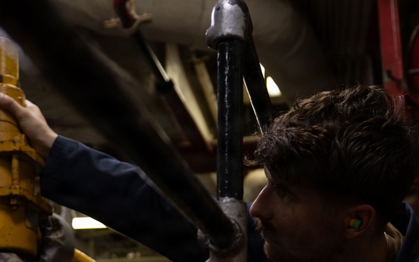 USS Iwo Jima Sailors Preform Boiler Maintenance