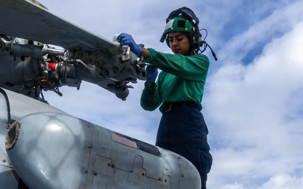 USS Iwo Jima Sailors Conduct Aircraft Maintenance