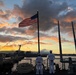 USS HOPPER sailors observe evening colors overlooking USS Arizona Memorial at Joint Base Pearl Harbor, Hawaii