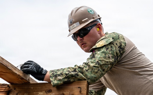 NMCB 1 Sailors conduct roof restoration operations in Saipan following Super Typhoon Sinlaku