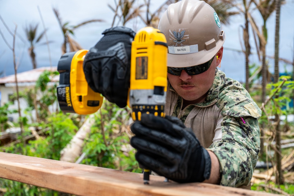 NMCB 1 Sailors conduct roof restoration operations in Saipan following Super Typhoon Sinlaku