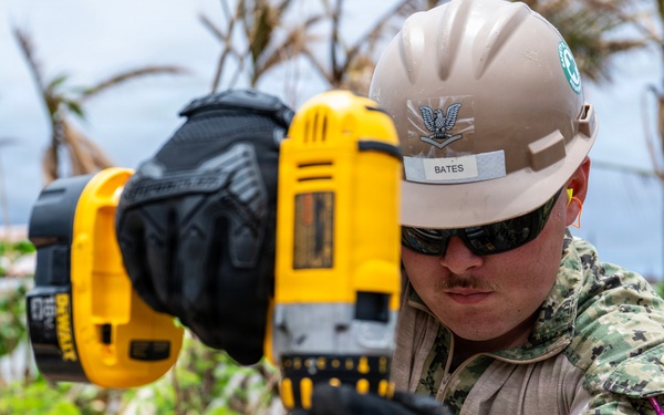 NMCB 1 Sailors conduct roof restoration operations in Saipan following Super Typhoon Sinlaku