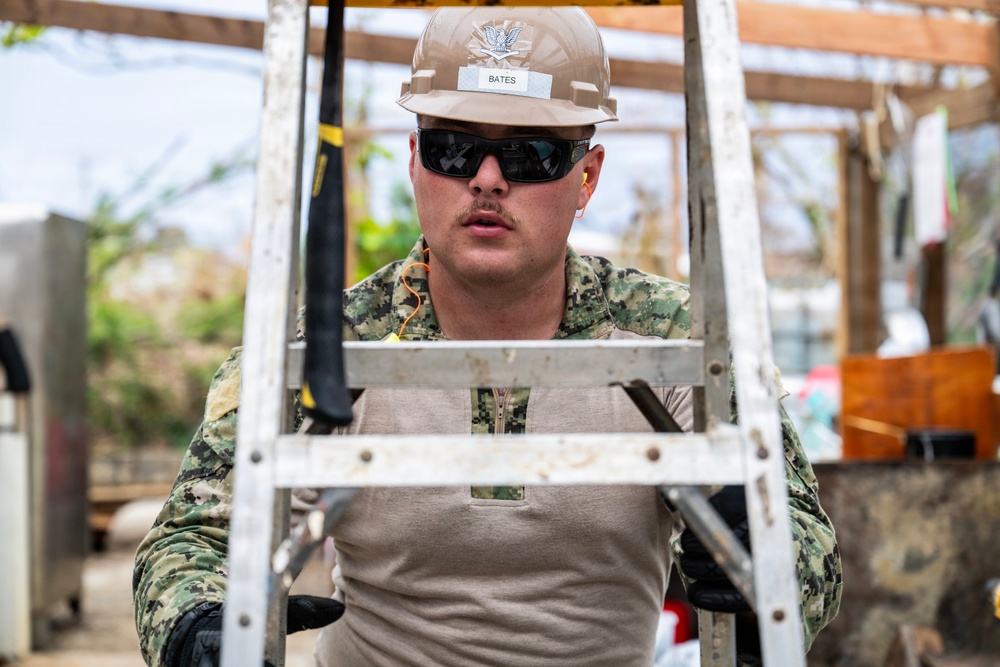 NMCB 1 Sailors conduct roof restoration operations in Saipan following Super Typhoon Sinlaku