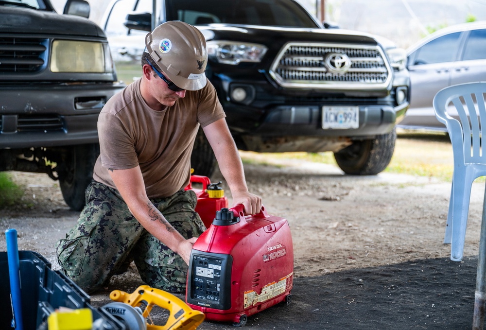 NMCB 1 Sailors conduct roof restoration operations in Saipan following Super Typhoon Sinlaku