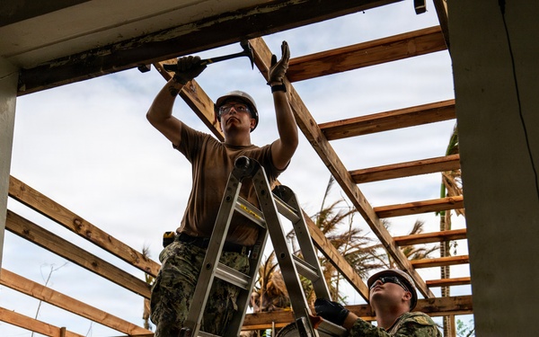 NMCB 1 Sailors conduct roof restoration operations in Saipan following Super Typhoon Sinlaku