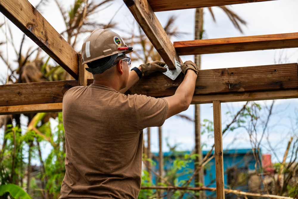 NMCB 1 Sailors conduct roof restoration operations in Saipan following Super Typhoon Sinlaku