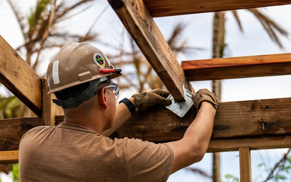 NMCB 1 Sailors conduct roof restoration operations in Saipan following Super Typhoon Sinlaku