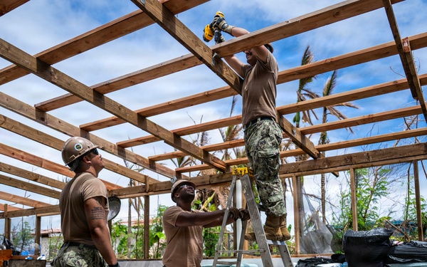 NMCB 1 Sailors conduct roof restoration operations in Saipan following Super Typhoon Sinlaku