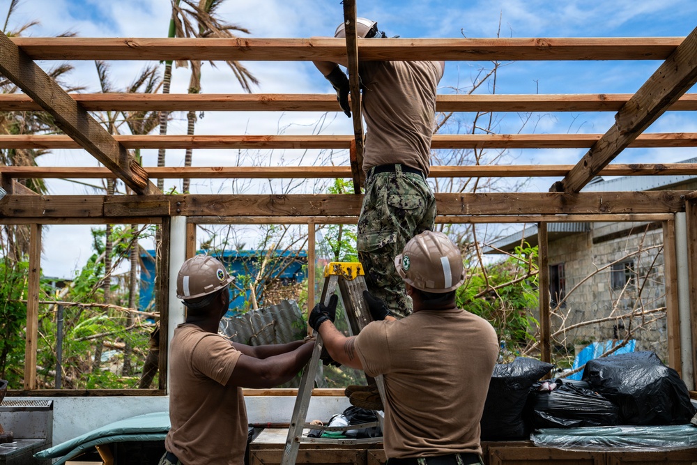 NMCB 1 Sailors conduct roof restoration operations in Saipan following Super Typhoon Sinlaku
