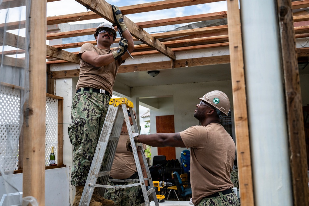 NMCB 1 Sailors conduct roof restoration operations in Saipan following Super Typhoon Sinlaku