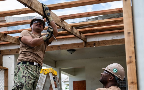 NMCB 1 Sailors conduct roof restoration operations in Saipan following Super Typhoon Sinlaku