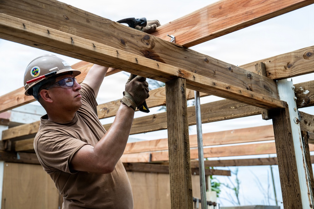 NMCB 1 Sailors conduct roof restoration operations in Saipan following Super Typhoon Sinlaku