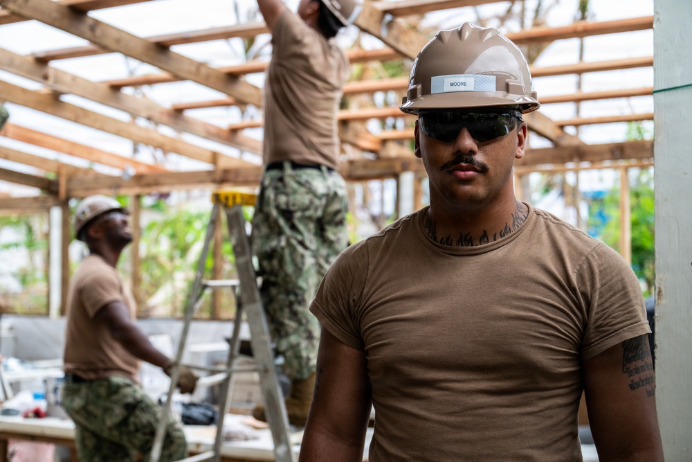 NMCB 1 Sailors conduct roof restoration operations in Saipan following Super Typhoon Sinlaku
