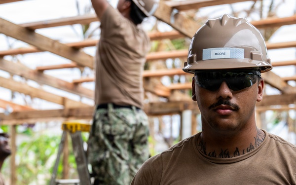 NMCB 1 Sailors conduct roof restoration operations in Saipan following Super Typhoon Sinlaku