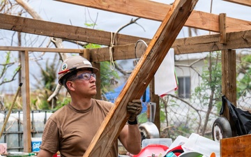 NMCB 1 Sailors conduct roof restoration operations in Saipan following Super Typhoon Sinlaku