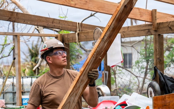 NMCB 1 Sailors conduct roof restoration operations in Saipan following Super Typhoon Sinlaku
