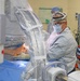 VA surgeon operates on patients in naval facility
