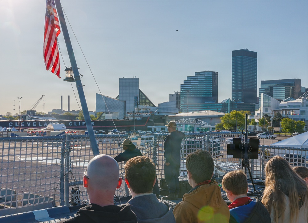 Scouts attend future USS Cleveland morning colors during commissioning week