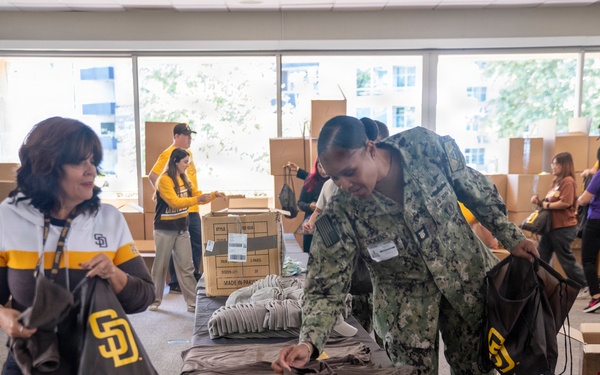 Care Package Preparation for Deployed Carrier Strike Groups at Petco Park