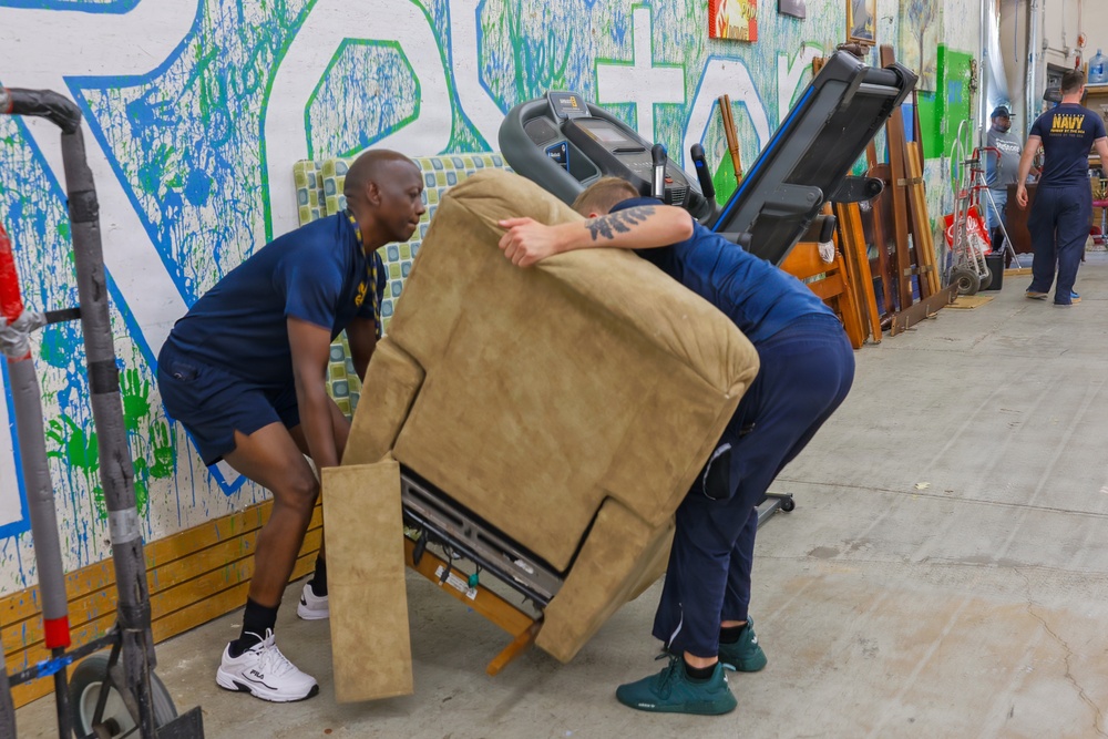 Charlotte Navy Week Sailors volunteer at Habitat for Humanity ReStore