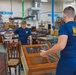 Charlotte Navy Week Sailors volunteer at Habitat for Humanity ReStore