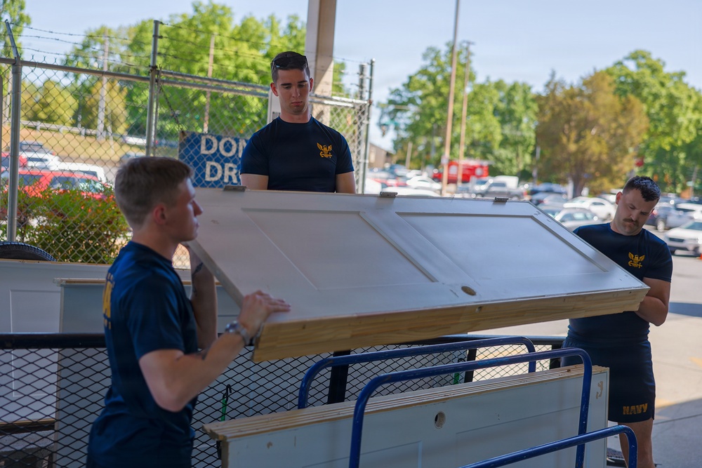 Charlotte Navy Week Sailors volunteer at Habitat for Humanity ReStore