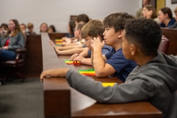 Local elementary school students participate in Law Day mock trial at Altus