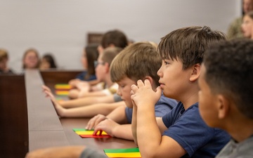 Local elementary school students participate in Law Day mock trial at Altus