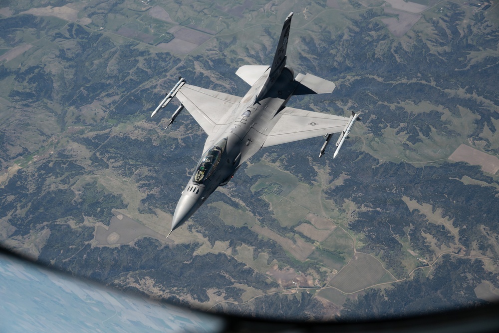 F-16 departs after aerial refueling