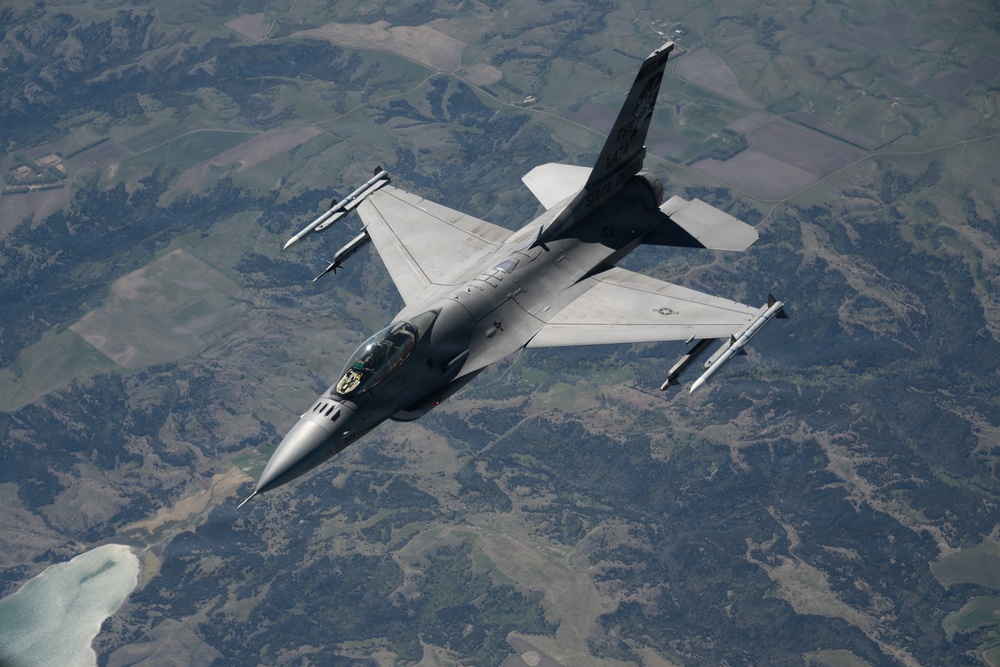 F-16 departs after aerial refueling