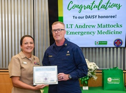 Nurse honored for compassionate care for Marine at NMCCL