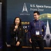 Blanca Nuno and Adrian Torres speak to attendees during Space Symposium
