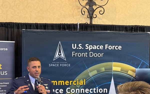 Col. Timothy Trimailo speaks to attendees at Space Symposium