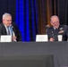 Moderator Rainer Horn interviews Col. Jon Strizzi at Space Symposium