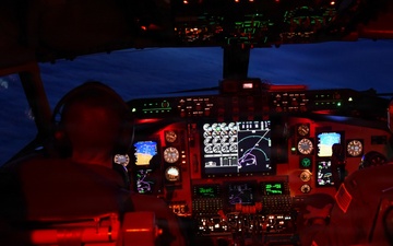 Airmen perform duties in cockpit