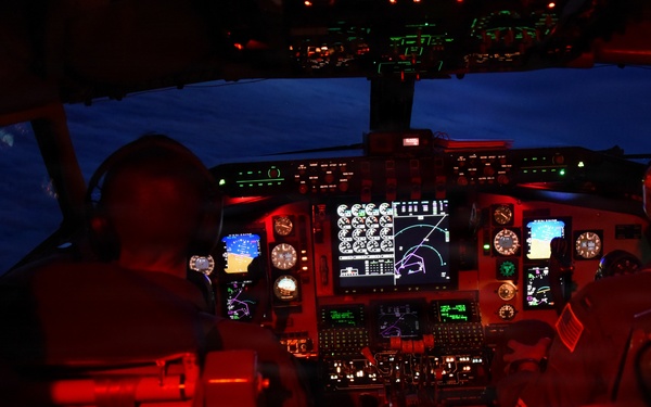 Airmen perform duties in cockpit