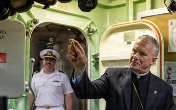 Archbishop for the Military Services blesses future USS Cleveland during commissioning week