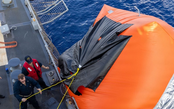 USS Mustin conducts a "killer tomato" inflatable surface target live-fire exercise